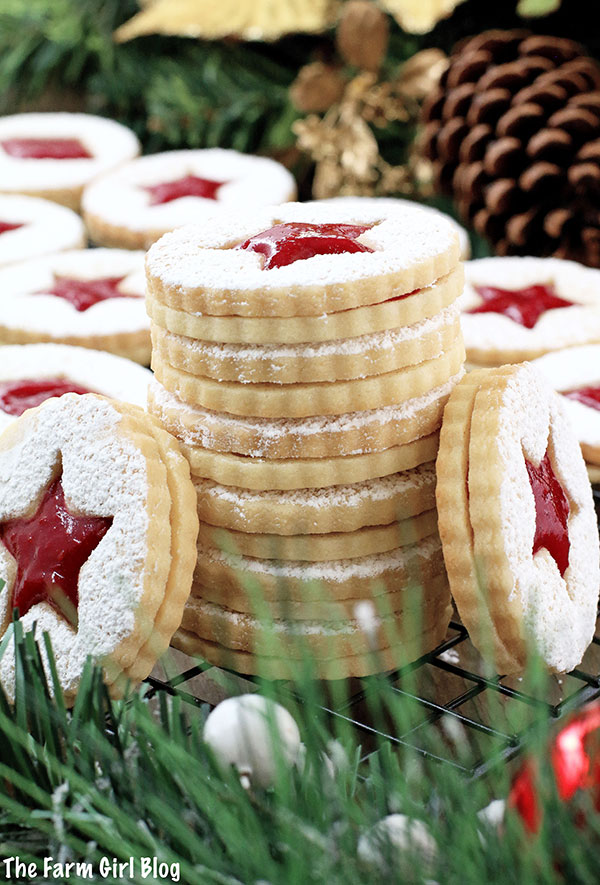 A super easy cookie recipe that will make your taste buds dance! Crunchy at first, before they’re assembled, but soften once they absorb the jam filling. Either way, they are so delicious and bursting with raspberry flavor! You simply won’t be able to resist going for more! That is, if the kids leave any... They look beautiful, delicate and festive. Perfect for the winter holiday season with a snow-sprinkled design. 