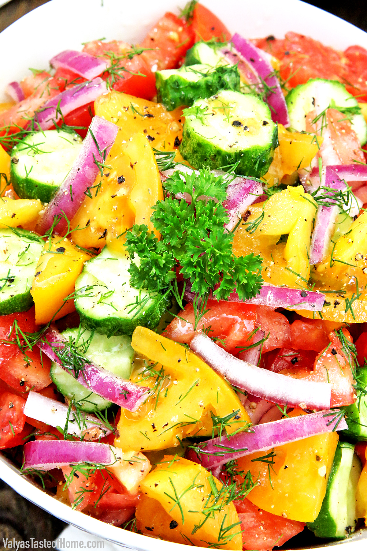 This Simple and Fresh Cucumber Tomato Garden Salad is amazingly refreshing and scrumptious! It's usually not summer for us if we haven't enjoyed this salad made from fresh, organically homegrown, crispy garden veggies.