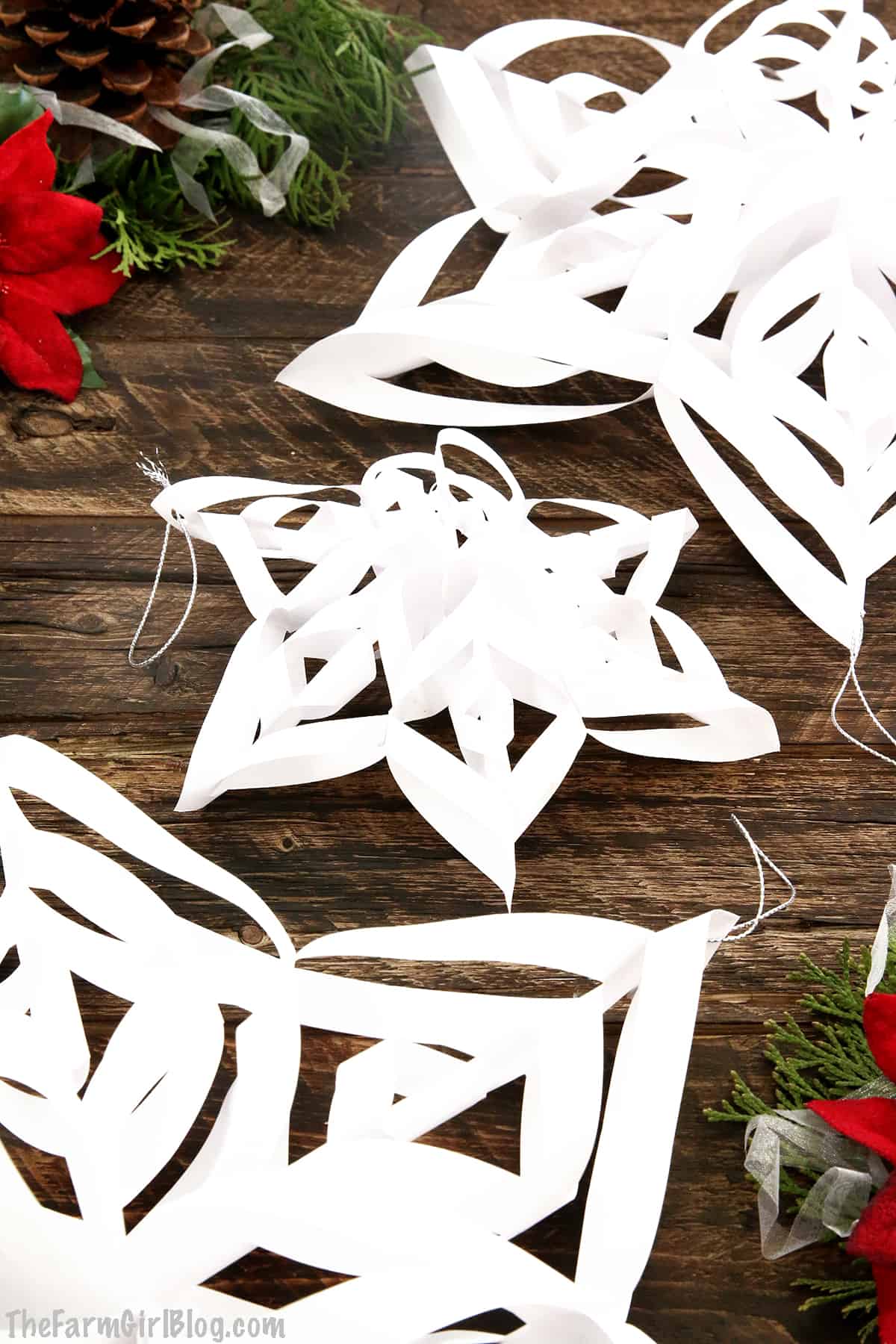 Kids' Christmas break is just around the corner and I have the perfect project for them to do alone or as a family. These Easy 3D Paper Snowflakes are so much fun to make not only for kids but adults enjoy them as well. 